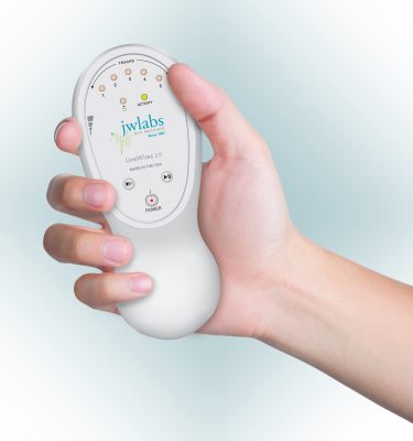 Hand holding a JWLABS LiveWires 2.0 device, showcasing its interface and buttons, relevant to Rife therapy discussion.