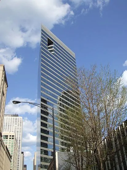 Modern office building of the American Medical Association in Chicago, reflecting the influence of the pharmaceutical and food industries on health choices.